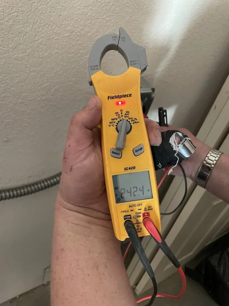 Voltage testing with clamp meter during Whole House Surge Protector in Rahway